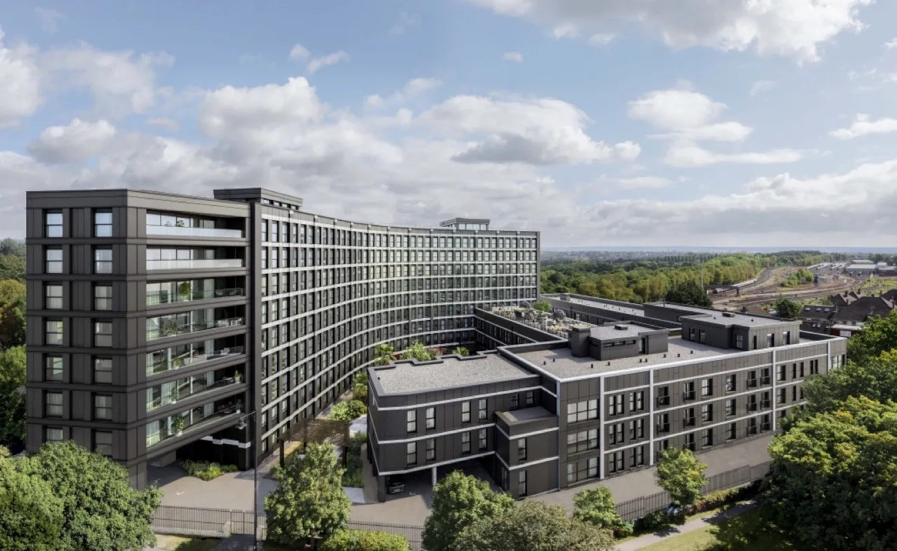 Contemporary residential development under a wide sky